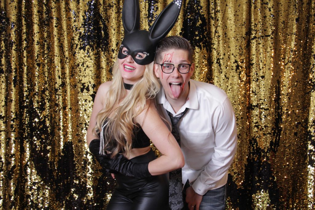bunny ears with a black and gold sequin backdrop is top