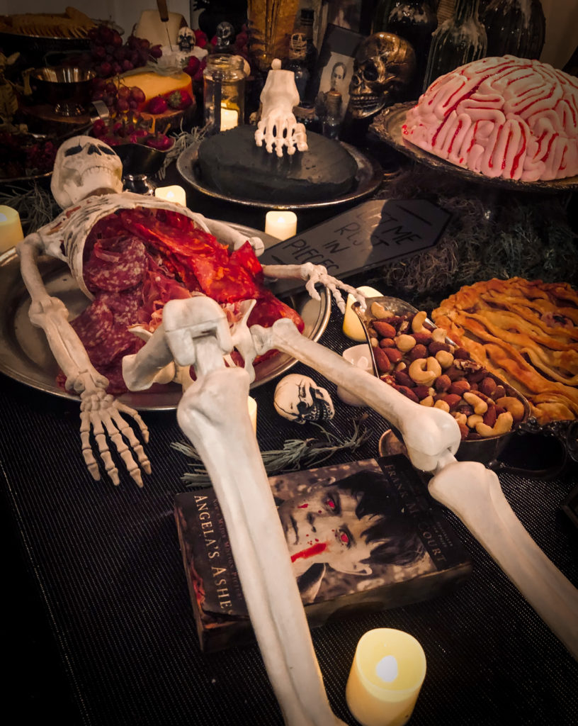 halloween dinner with a spooky skeleton stuffed by salami