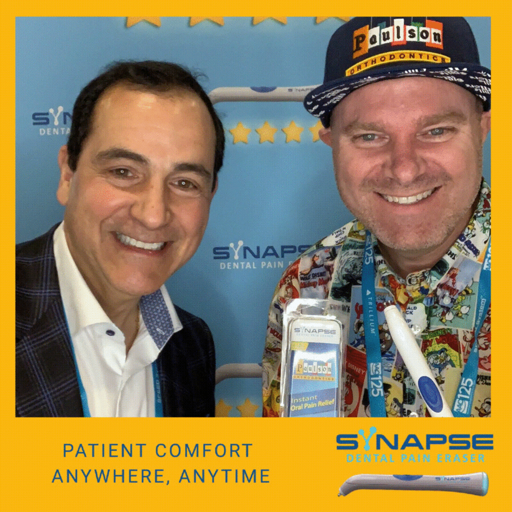 guys posing with the Synapse product in a selfie booth