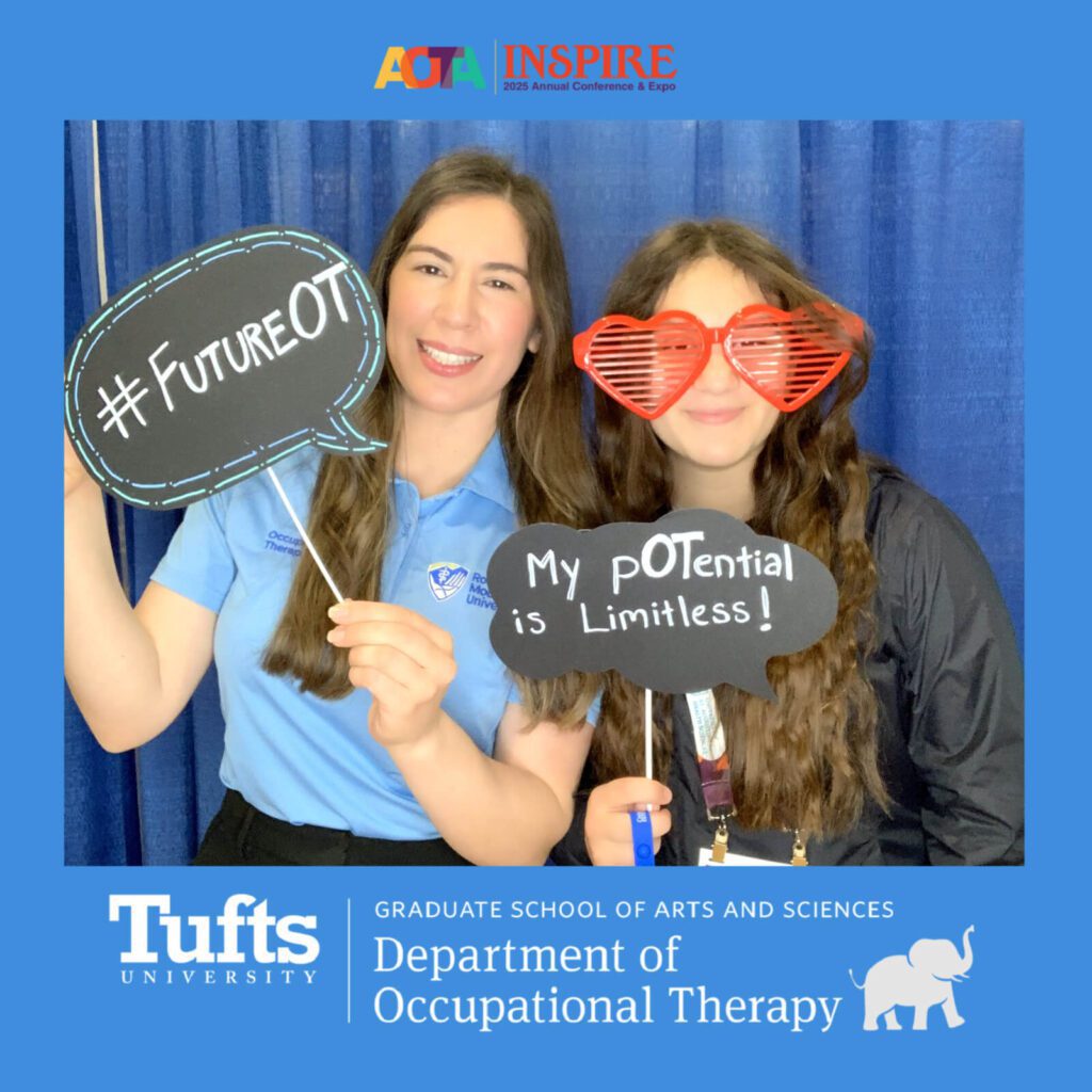 girls posing with props in a photo booth with blue backdrop from the curtains of the booth at the PA convention center.